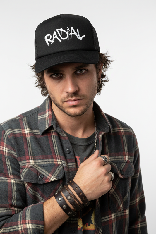 Grunge male model wearing Radial black trucker hat
